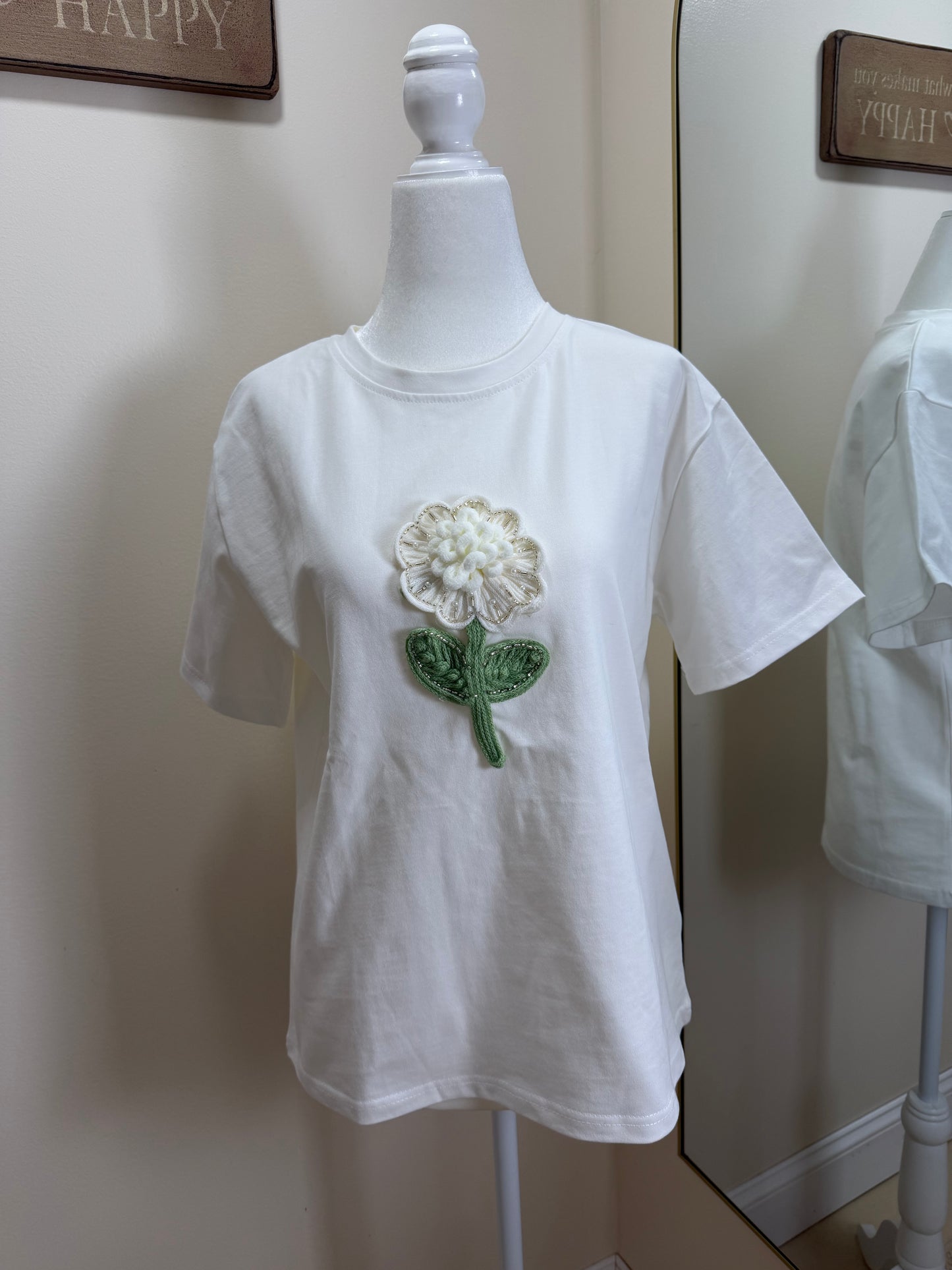 White shirt with flower