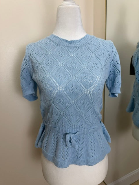 Blue knit peplum top