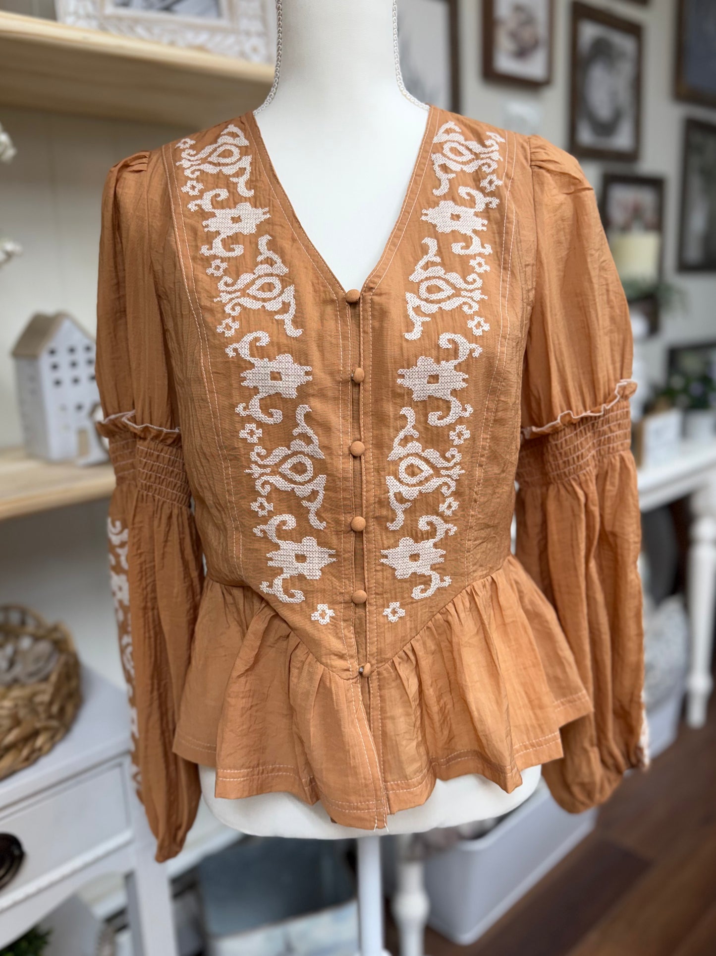 Terracotta peplum blouse