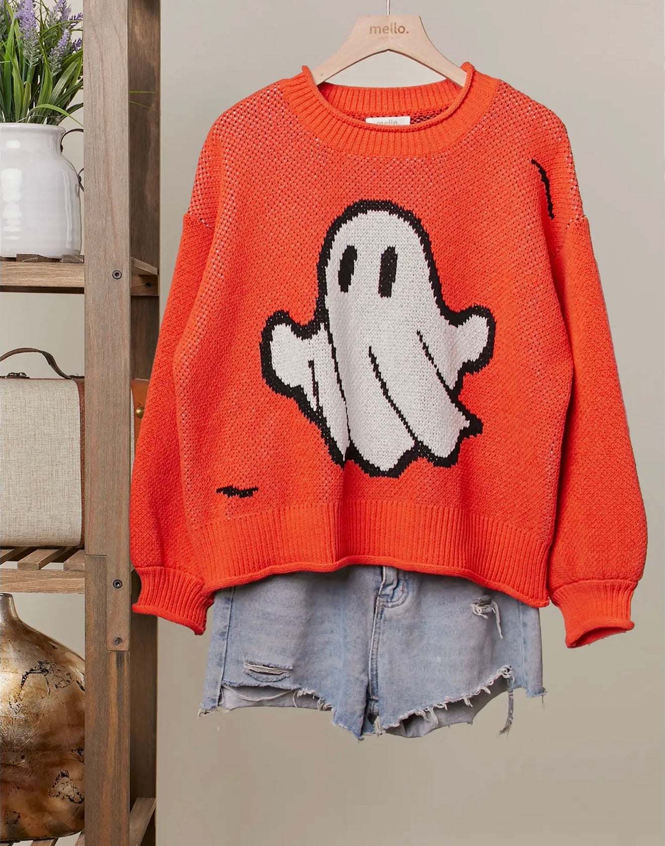Orange ghost sweater