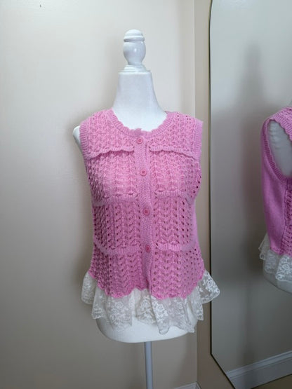Pink sleeveless knit top